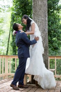 couple by tall tree
