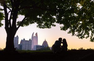 silhouette of couple with Atlanta's city skyline