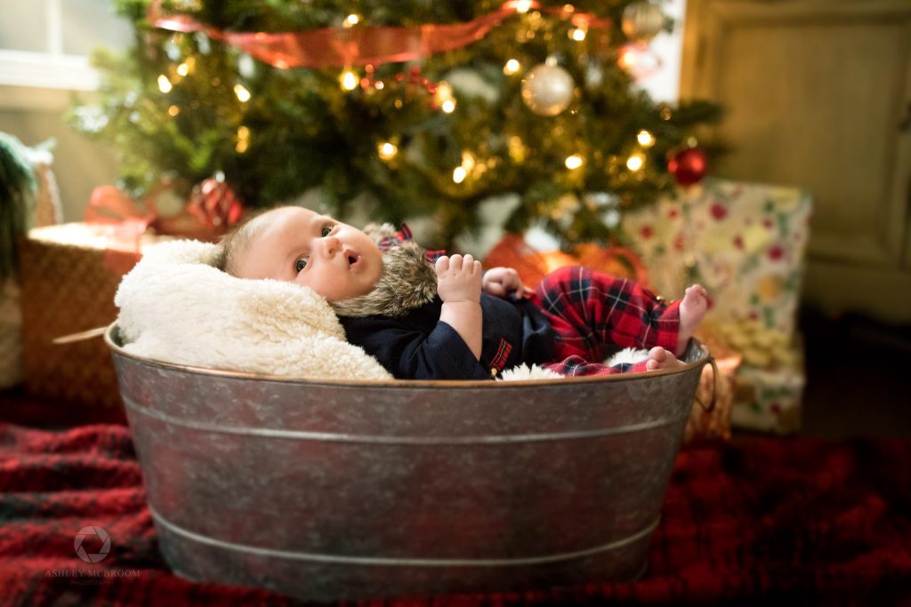 atlanta newborn photographer baby in a bucket by christmas tree