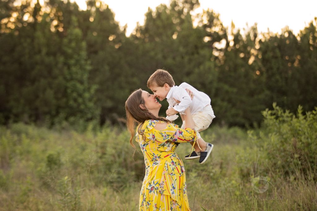 maternity photography mom holding little boy