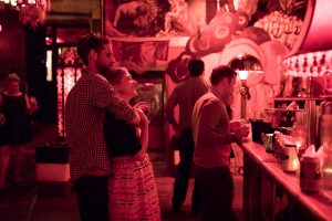 couple by bar