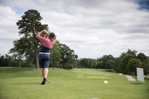 action shot golfing