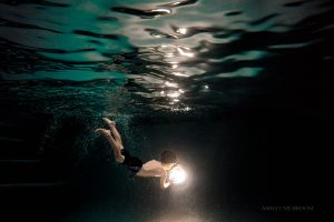 Atlanta child swimming at night