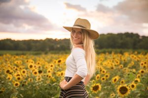 east cobb senior photos girl in sunflower field