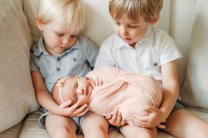 sweet brothers and baby sister newborn pics