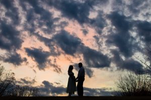 atlanta maternity photography couple with sky