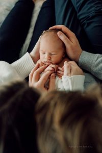 newborn baby boy sleeping during photo session