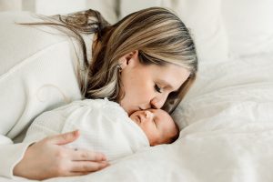 mom and baby at newborn photo session in atlanta