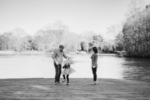 family together by the lake in Atlanta