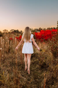 ending the best roswell senior photos session with a walk through the fields