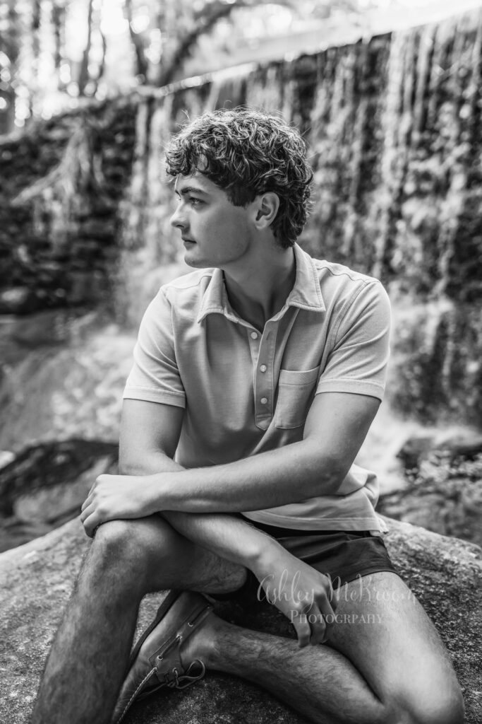 Black and white high school senior portrait outdoors in Marietta GA