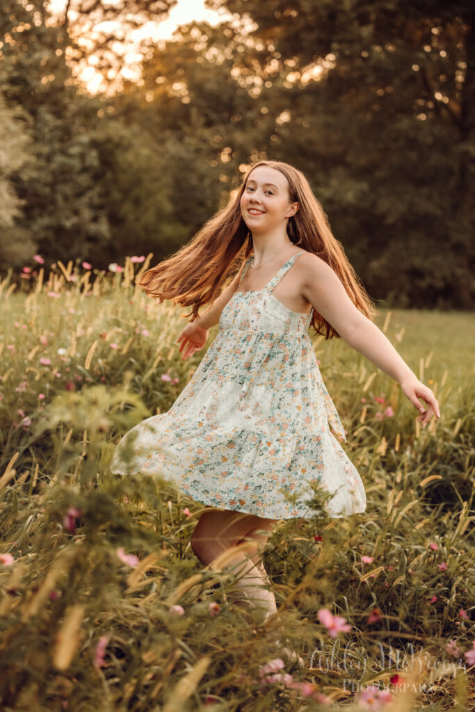 Campbell High IB program senior ballerina twirling in a field of flowers