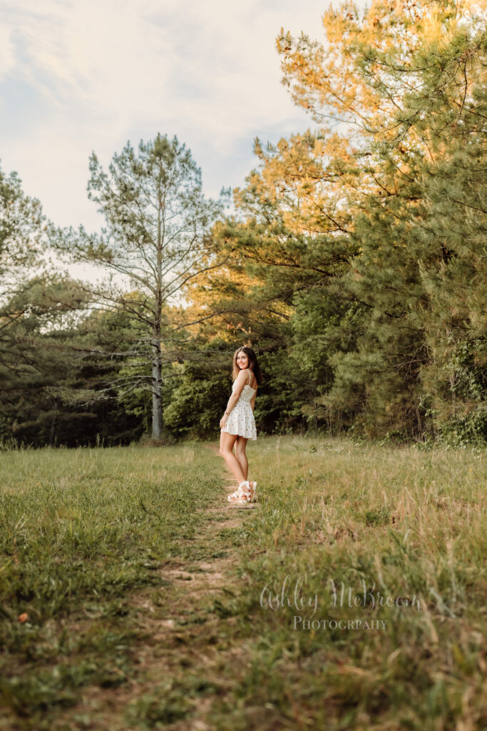 Golden hour senior pictures in a field in Canton, Georgia