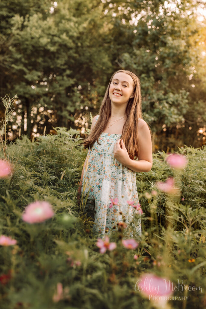Campbell IB program senior portraits in a field of blooming flowers