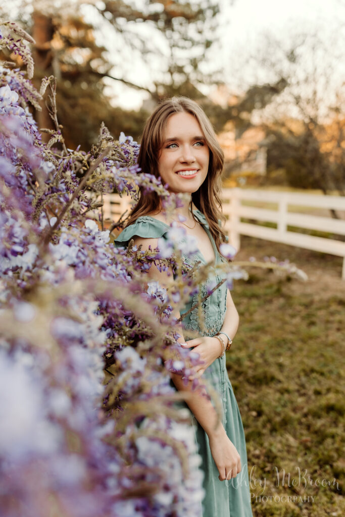 Walton senior photography session by purple wisteria