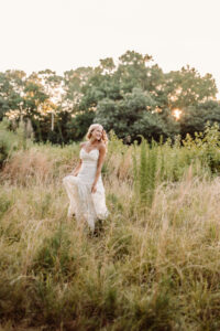 Golden hour field senior pictures for a Pope High School senior in Marietta, GA