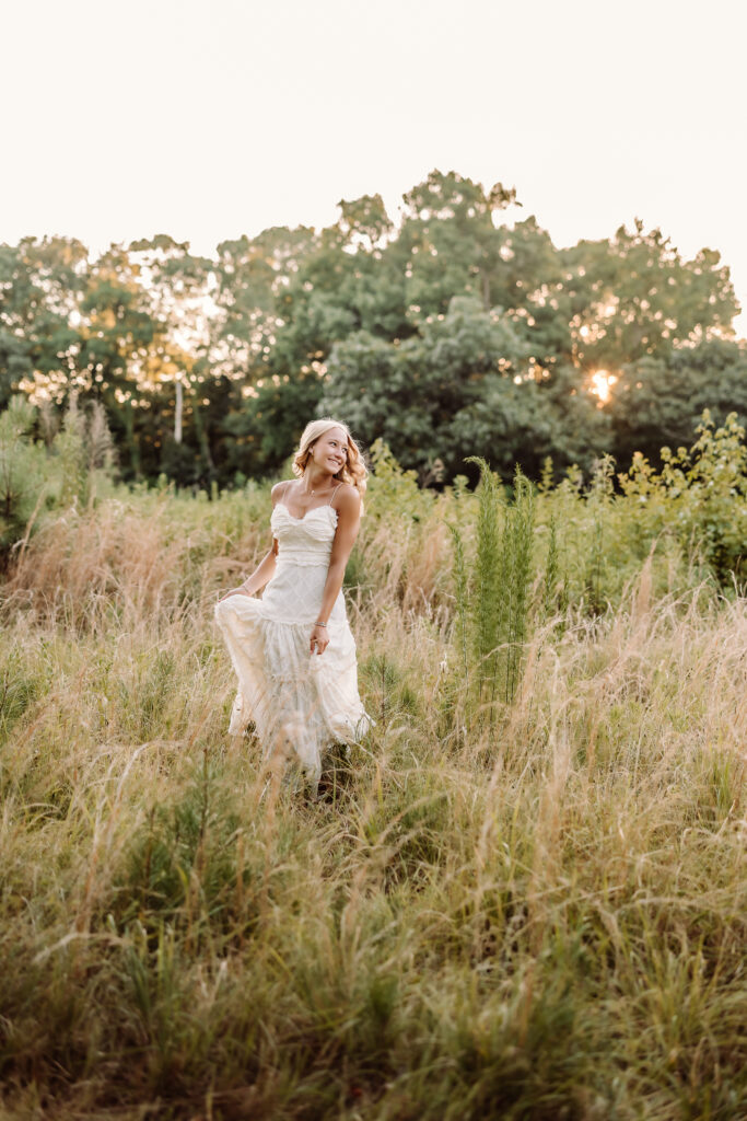 Golden hour field senior pictures for a Pope High School senior in Marietta, GA