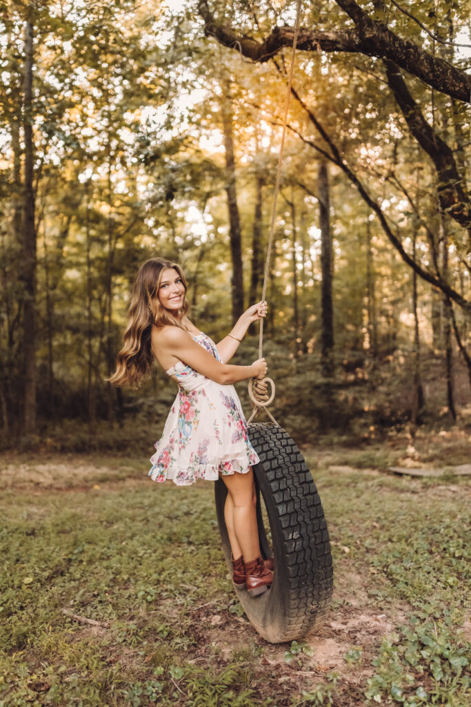 Roswell high school senior pictures on a tire swing